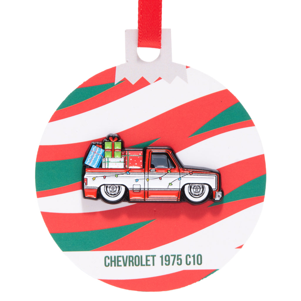 Decorative ornament with a vintage Chevrolet 1975 C10 truck design on a red, white, and green striped ornament background.