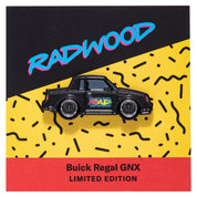 Metal enamel pin of a Buick Regal GNX in black on black mesh wheels with Radwood logo on passenger door. On backing card resembling designs from the 80s in black, yellow, and red with Radwood logo.