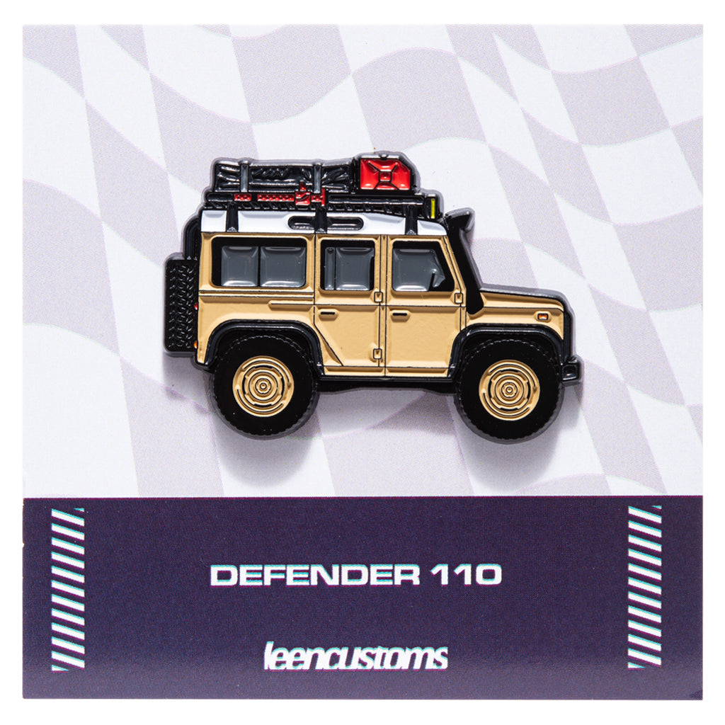 Enamel pin of a tan Land Rover Defender 110 model on a checker background with 'leencustoms' branding.