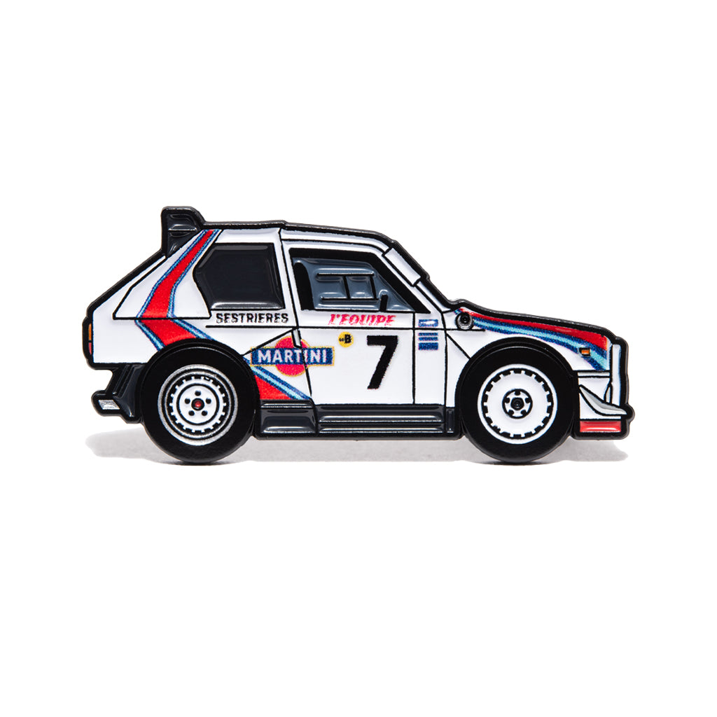 Enamel pin of Lancia Delta Integrale with Martini Racing livery on a white background