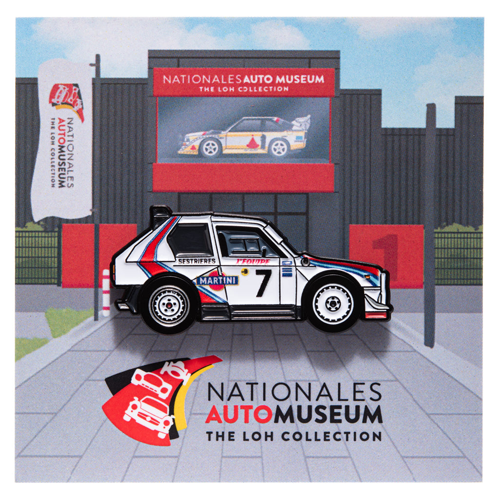 Enamel pin of Lancia Delta Integrale with Martini Racing livery in front of the Nationales Auto Museum backing card