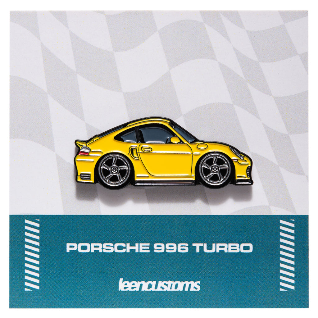Yellow Porsche 996 Turbo car enamel pin on a checkered background with Leen Customs branding.
