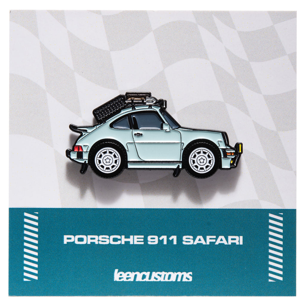 Pin of a Porsche 911 Safari car on a checkered patterned background with Leen Customs branding.