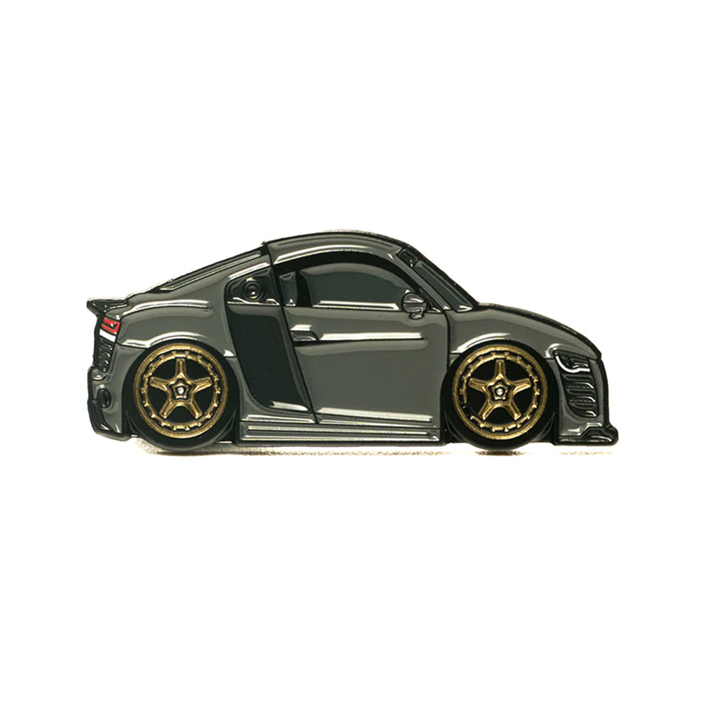 Soft enamel lapel pin of a charcoal grey Audi R8