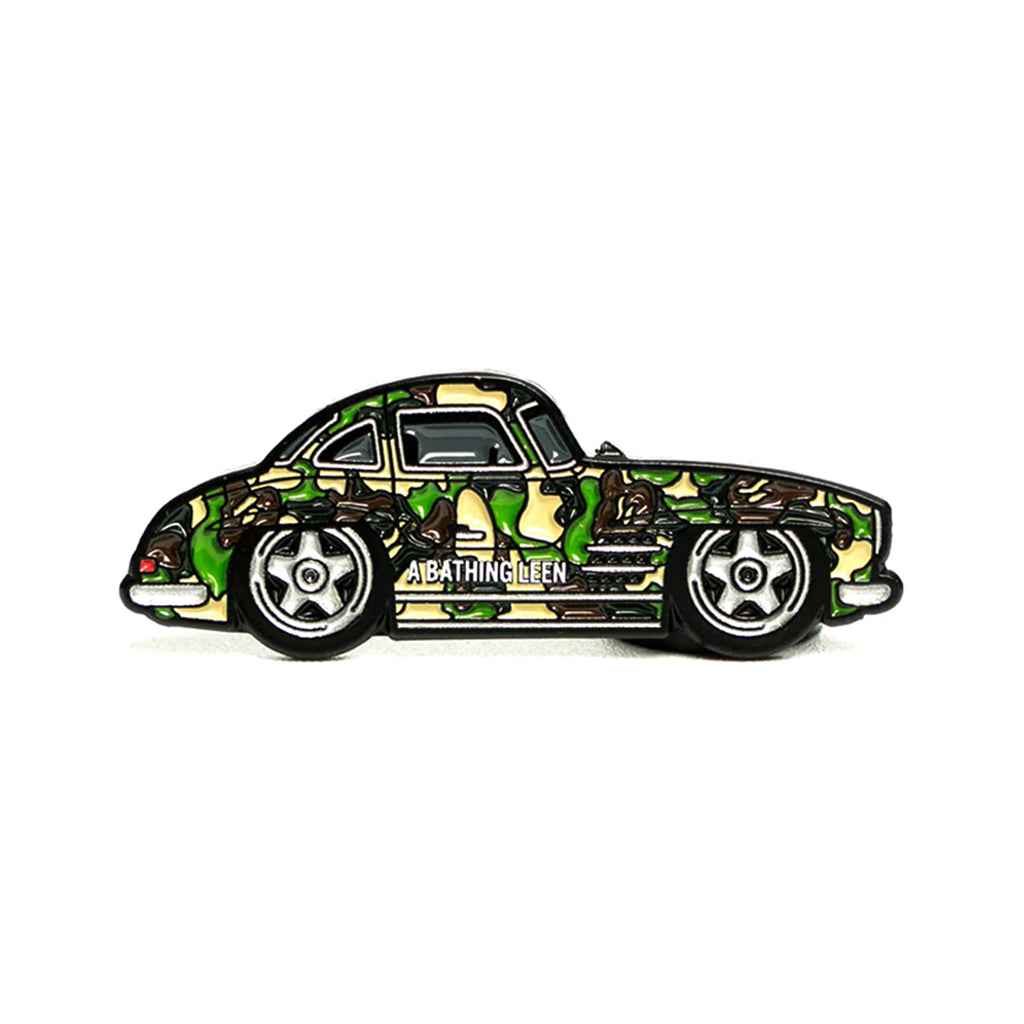 Soft enamel lapel pin of a camo colored Mercedes 300sl