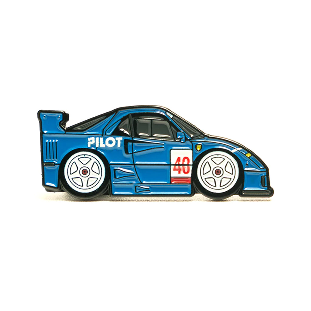 Soft enamel lapel pin of a Ferrari F40 with the iconic PILOT livery