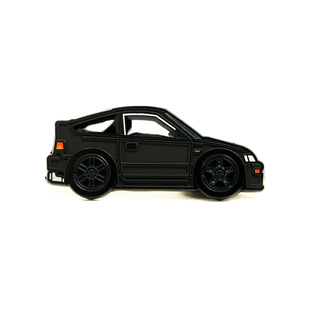 Soft enamel lapel pin of a matte black Honda CRX