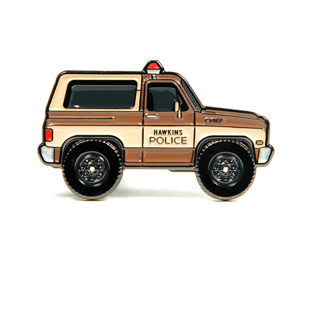 Soft enamel lapel pin of a 1980 Chevy K5 Blazer owned by the Hawkins Police Department and driven by Chief Jim Hopper.