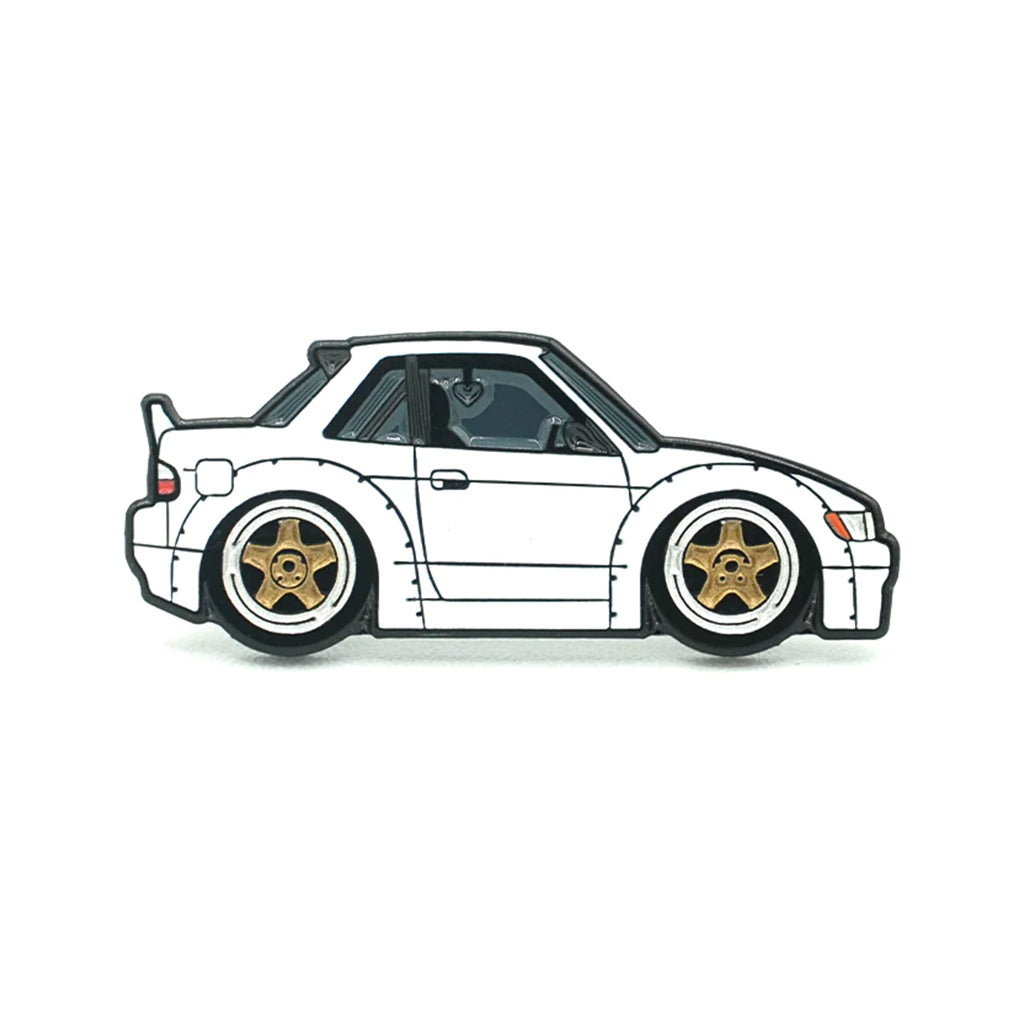 Soft enamel lapel pin of a white Nissan S13