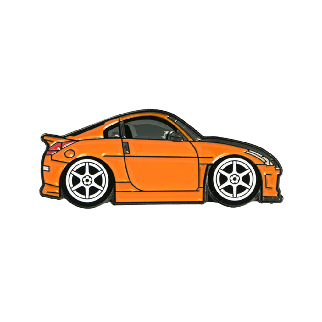 Soft enamel lapel pin of an orange Nissan 350z