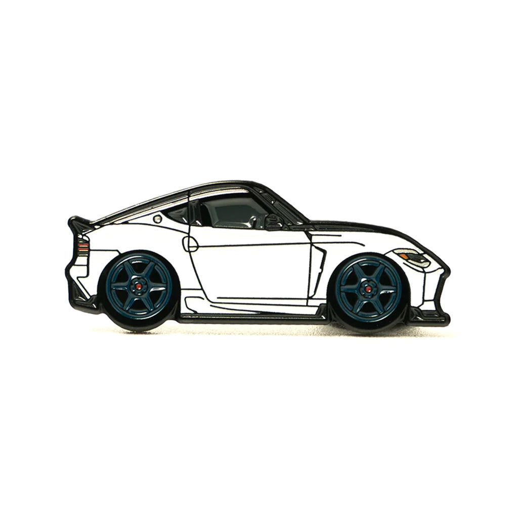 Soft enamel lapel pin of a white Nissan Z