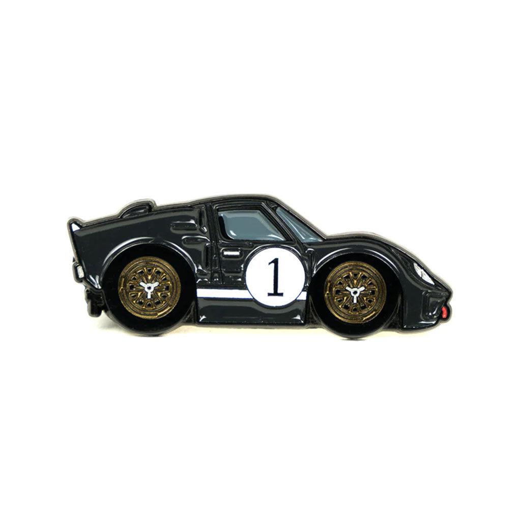 Soft enamel lapel pin of a black Ford GT40