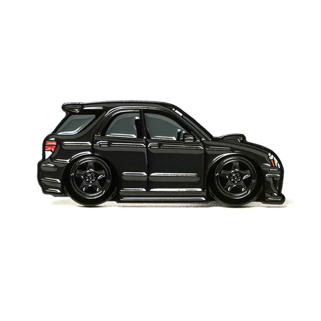 Soft enamel lapel pin of a black Gen 3 Subaru wagon