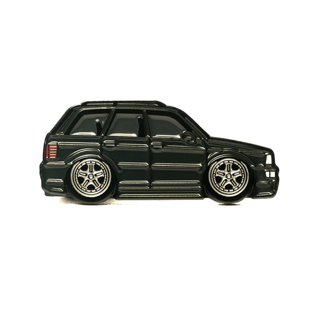 Soft enamel lapel pin of a black Audi B4 RS4