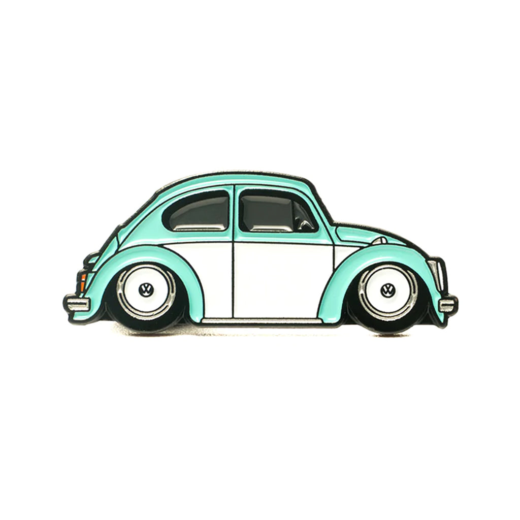 Soft enamel lapel pin of a aqua colored Volkswagen T1 Beetle