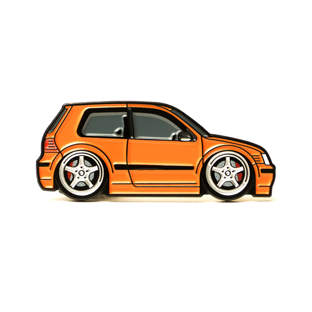 Soft enamel lapel pin of an orange Volkswagen MK4 GTI