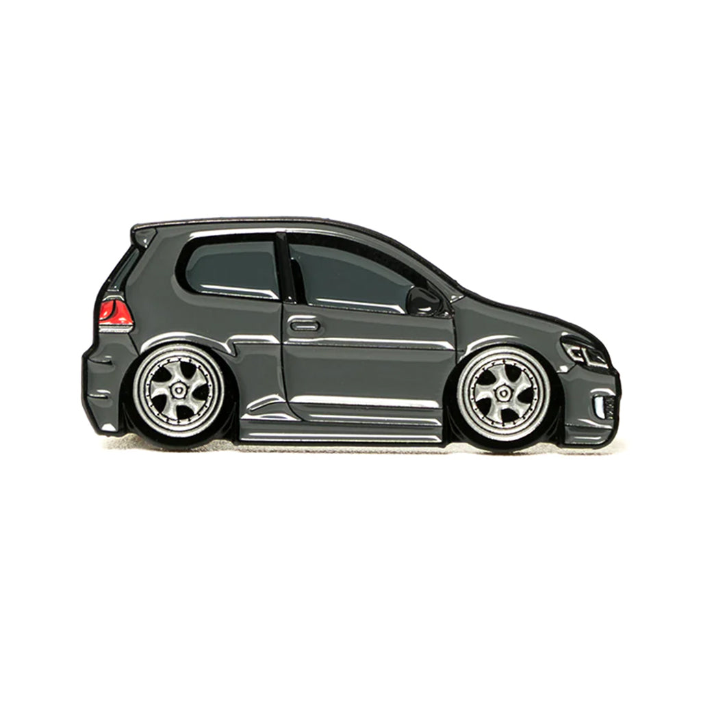 Soft enamel lapel pin of a grey Volkswagen Golf MK6